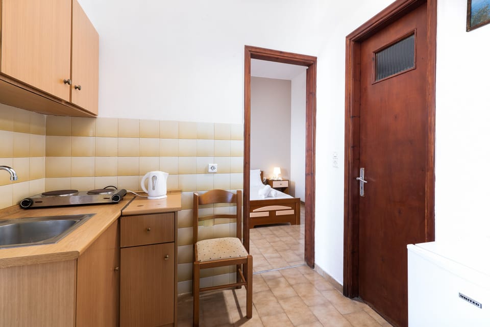 Apartment, Sea View | Private kitchenette | Fridge, electric kettle