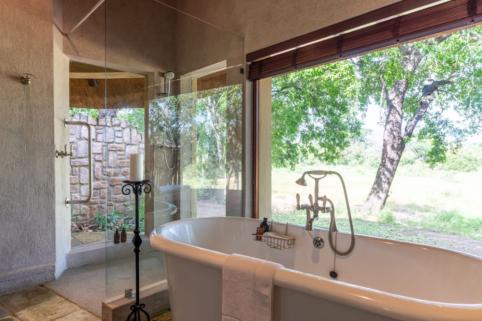 Separate tub and shower, free toiletries, hair dryer, bathrobes