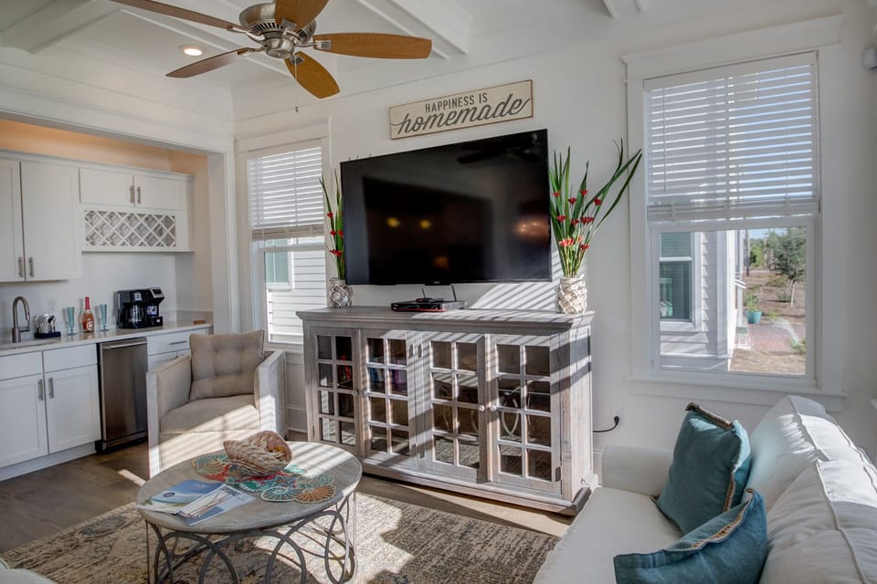 Living room attached to full wet bar ice maker