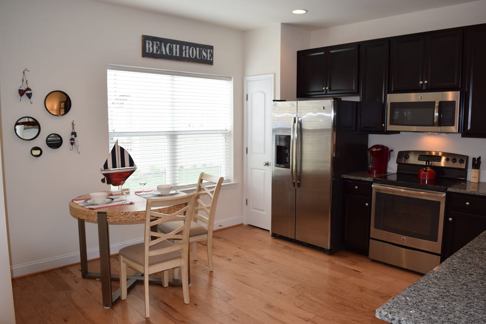 Kitchen w/ Granite, Stainless Steel Appliances, and Stocked for Cooking