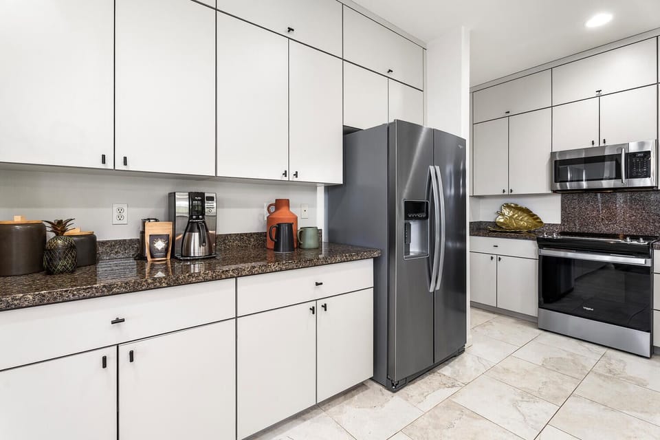 Savor culinary adventures in our fully-stocked kitchen with ample appliances and tools.