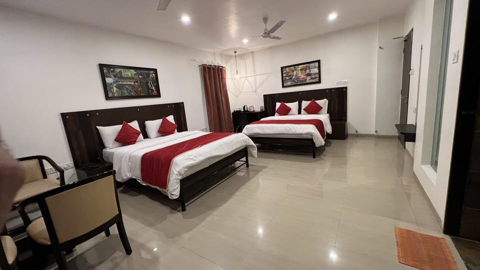 Deluxe Quadruple Room, 2 Double Beds, City View | Premium bedding, pillowtop beds, individually furnished, desk