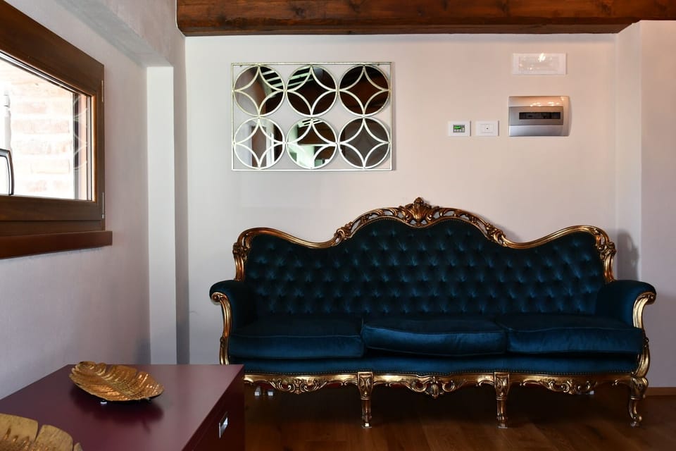 Triple Room | Living area | 28-inch flat-screen TV with digital channels, TV, heated floors