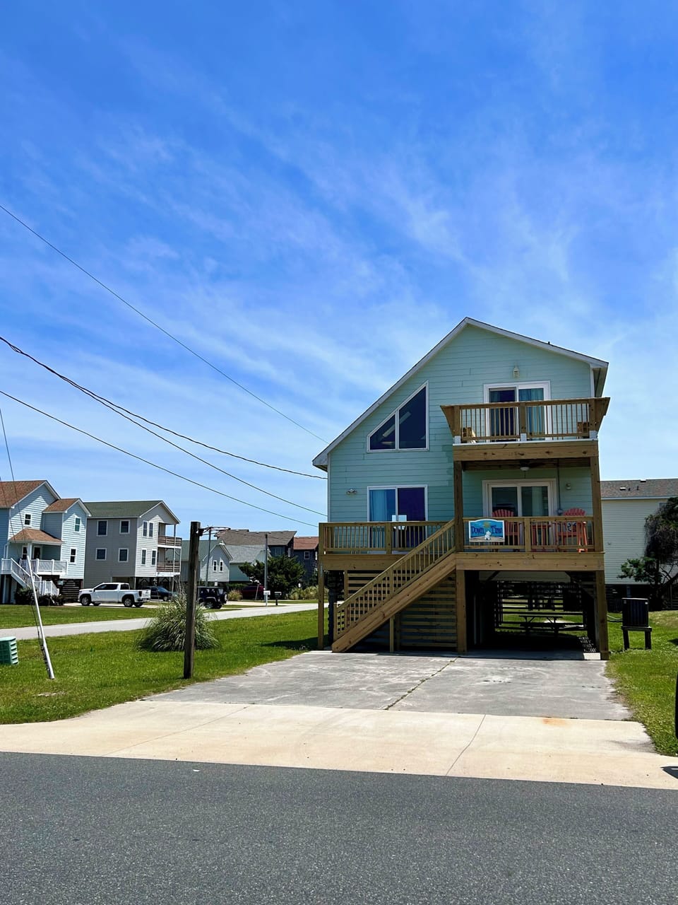 DownTime is on a corner lot one block from beach access! 