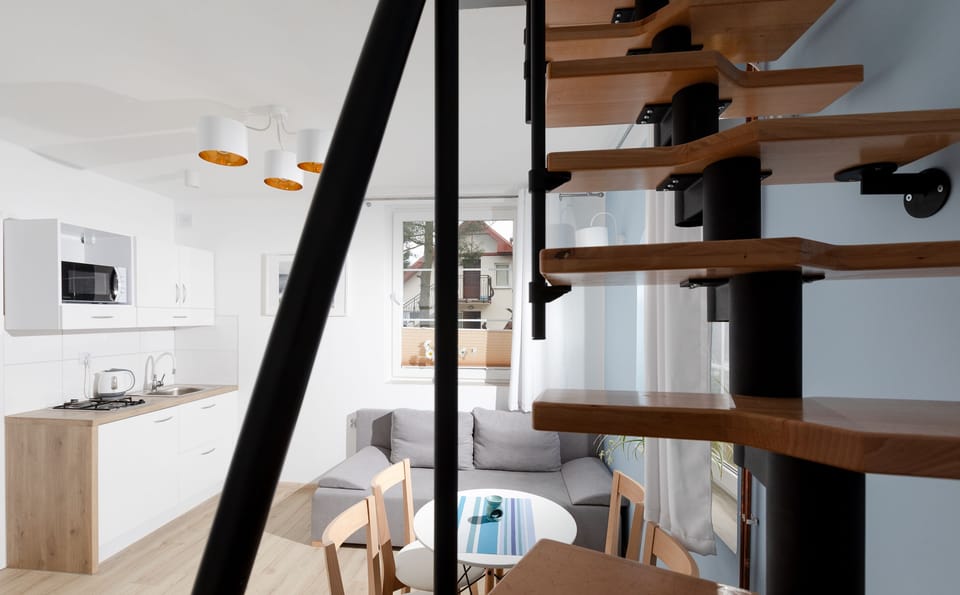 Superior Apartment, Kitchenette, Annex Building (Dwupoziomowy Trzyosobowy) | Hypo-allergenic bedding, blackout drapes, iron/ironing board, free WiFi