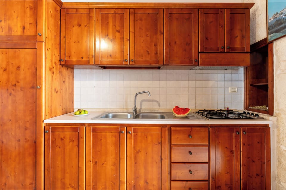 Exclusive Apartment, 1 Bedroom, Ground Floor | Private kitchen | Fridge, stovetop, coffee/tea maker, electric kettle