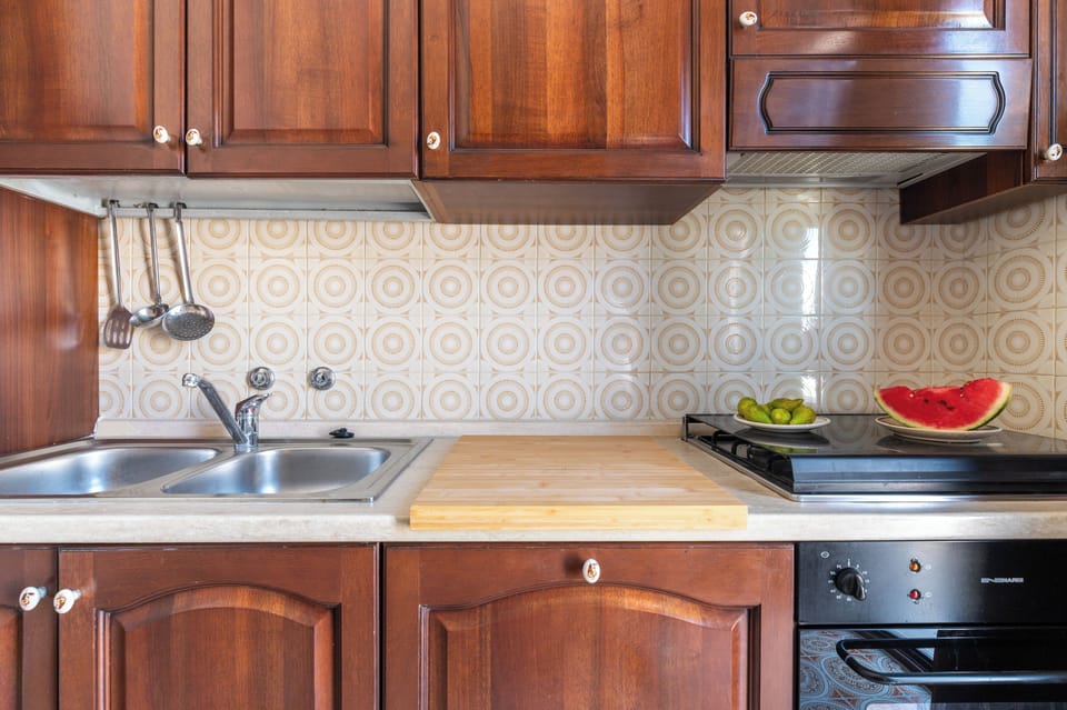 Exclusive Apartment, 1 Bedroom, Kitchen, Sea View | Private kitchen | Fridge, microwave, oven, stovetop