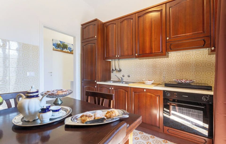 Exclusive Apartment, 1 Bedroom, Kitchen, Sea View | Private kitchen | Fridge, microwave, oven, stovetop