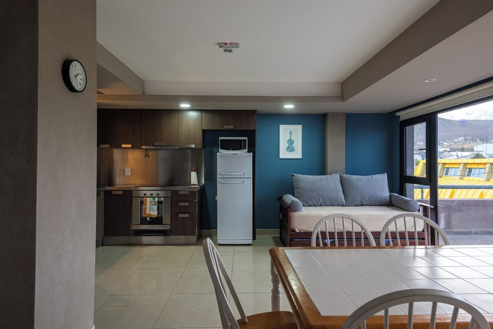 Apartment (Krund) | Living area | 32-inch LED TV with cable channels, pay movies, offices
