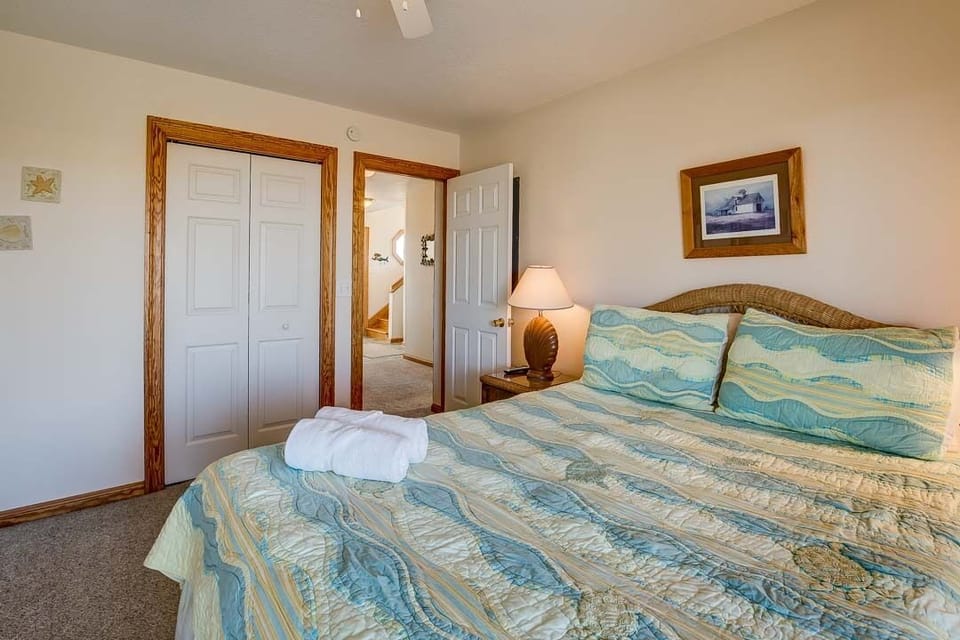 Mid-Level Queen Bedroom with Deck Access, shares Jack and Jill Bathroom