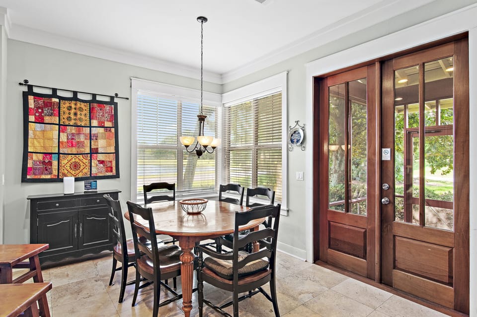 Dining area with views and screened porch access