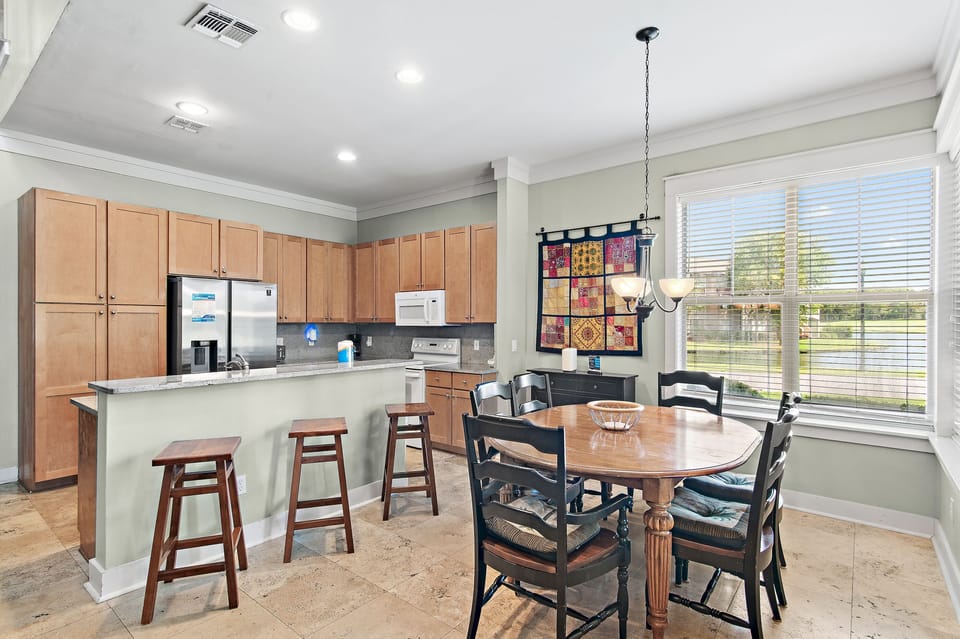 Fully equipped kitchen and dining area perfect for family meals and entertaining