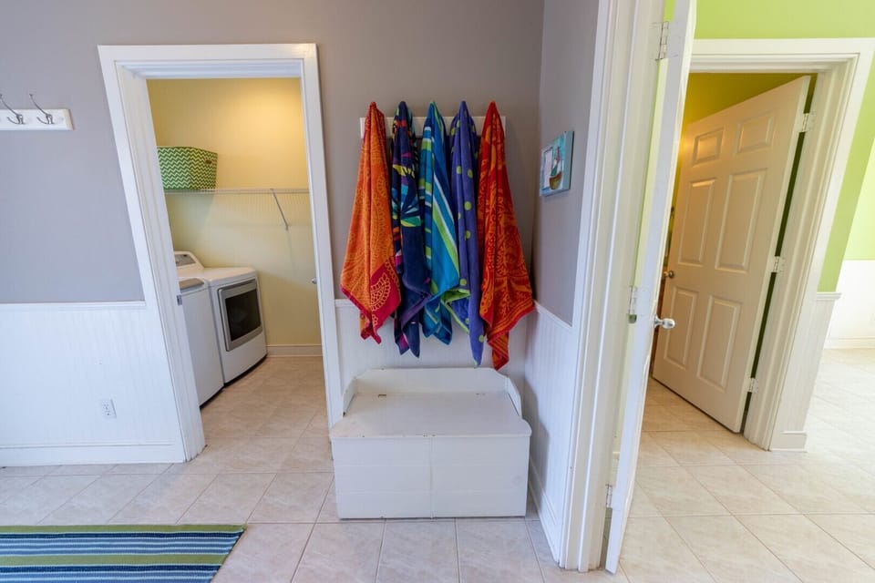 Foyer, ground level. Laundry room and bathroom in rumpus room