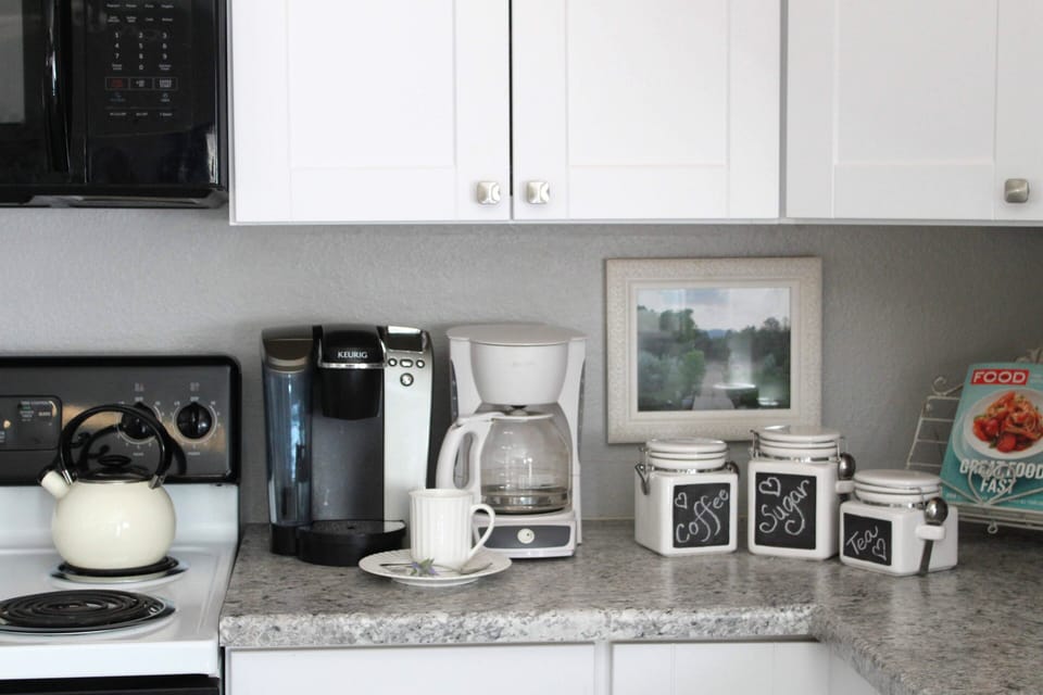 A coffeemaker, Keurig, and tea kettle so you can make your favorite morning brew