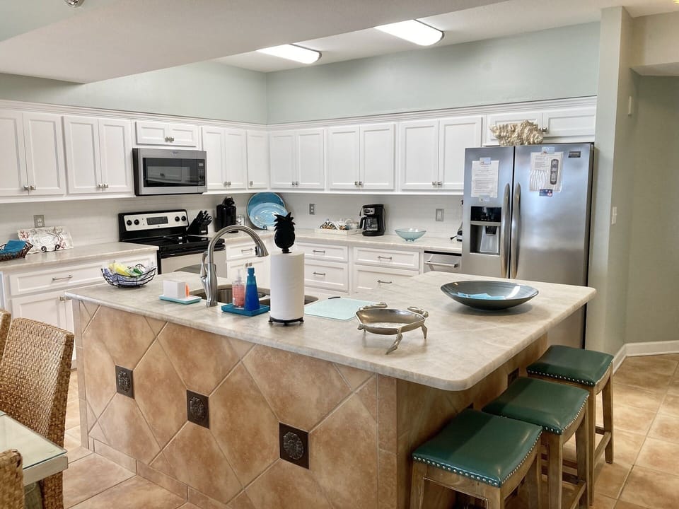 Fully Stocked Kitchen with breakfast Bar