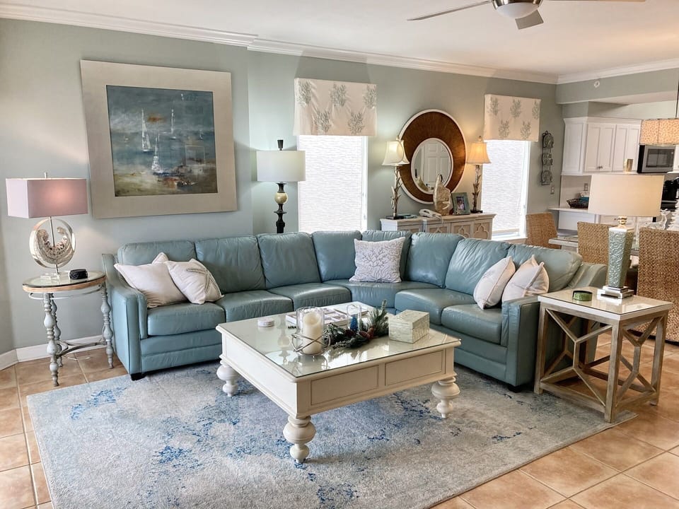 Spacious Living Room with Leather Sofa 
Opens to Gulf Front Balcony