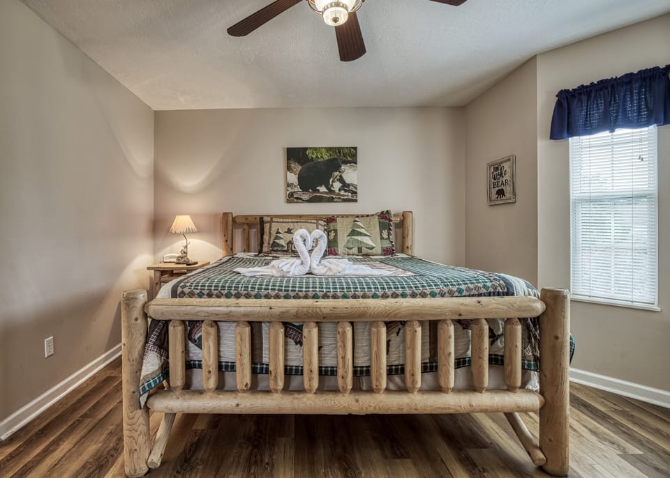Vacation Rental in Pigeon Forge "River Escape" - Bedroom with king size log bed