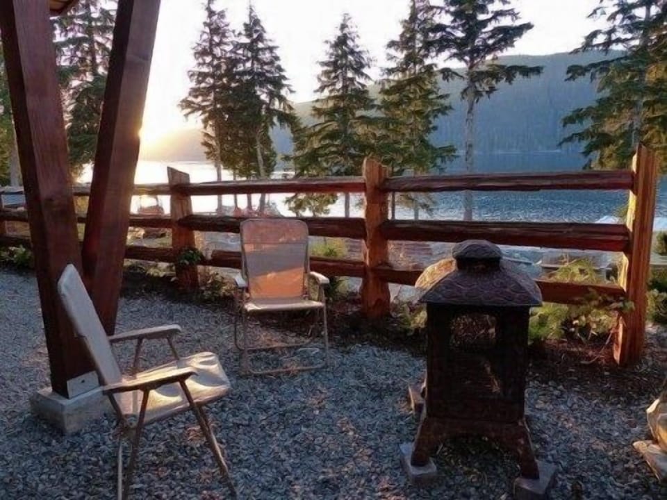 Outdoor fireplace with complimentary fire wood