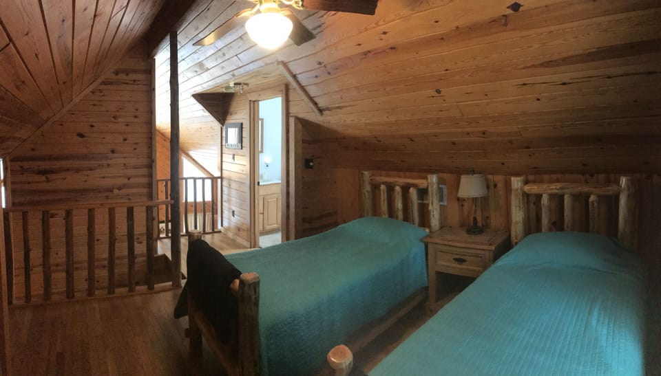 Loft sleeping area with private full bath