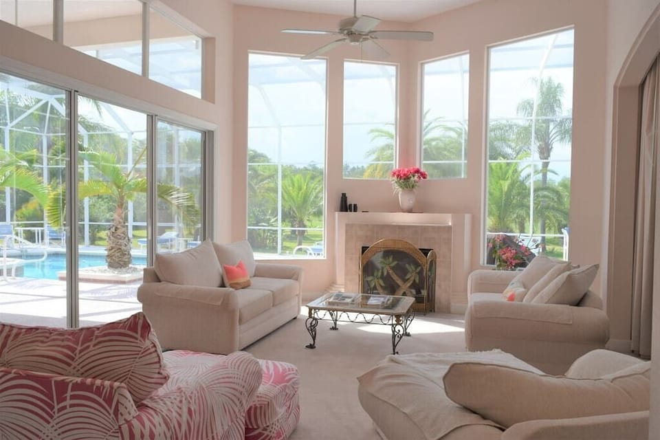 Living room, fireplace. pullout queen couch if needed.
18ft high windows .View to garden, pool , spa
