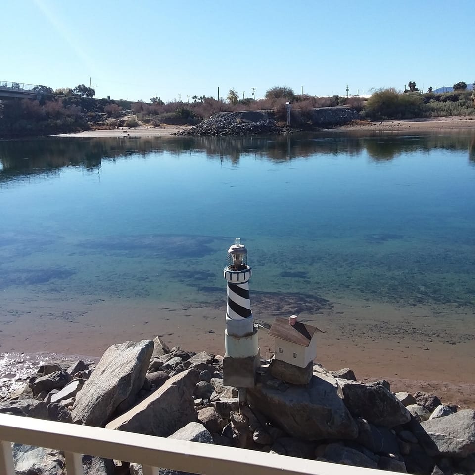Light House on the point of our water front deck