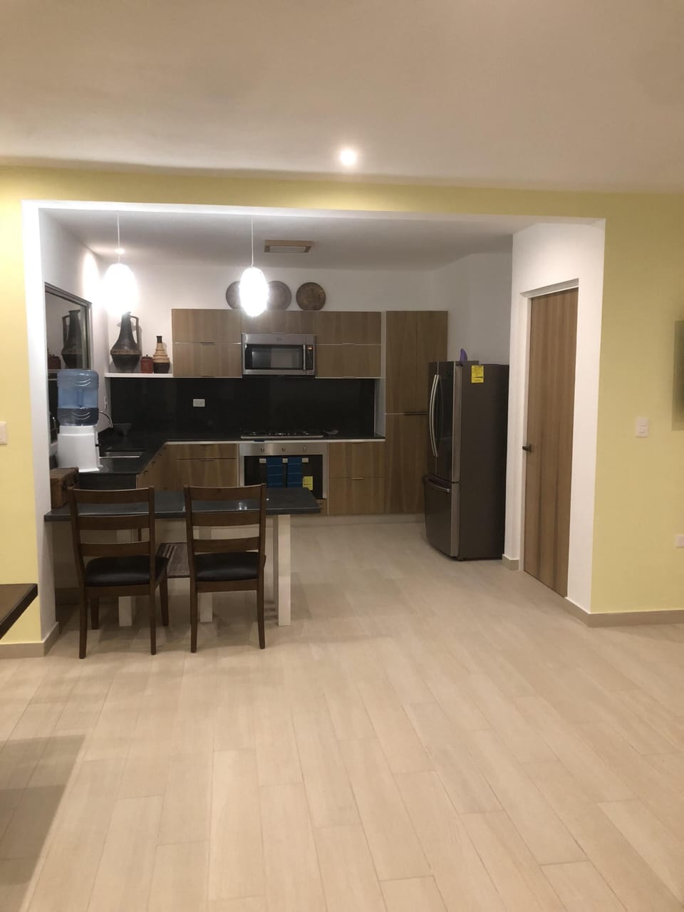 Gas stove, oven, microwave, full-size fridge, double sink.  
