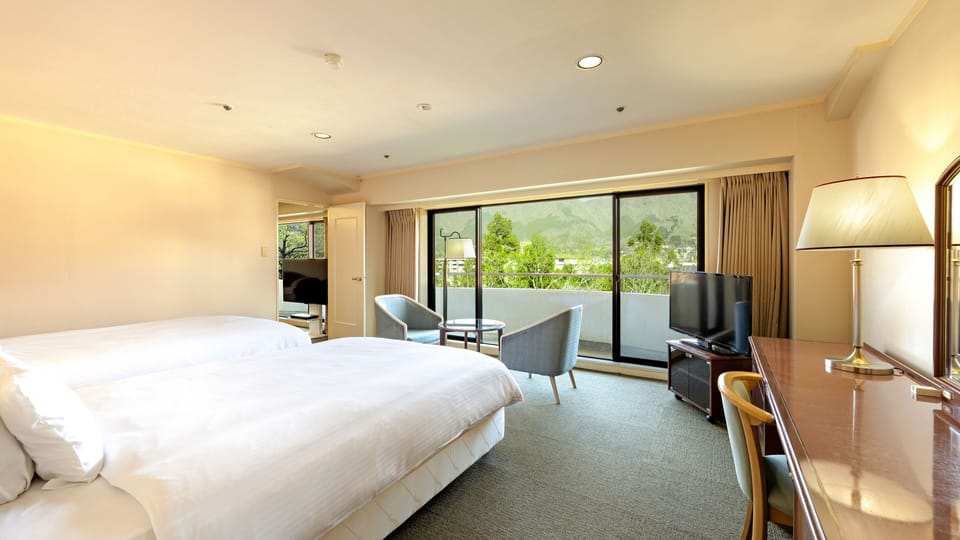 Suite, Non Smoking | Desk, laptop workspace, blackout drapes, free WiFi