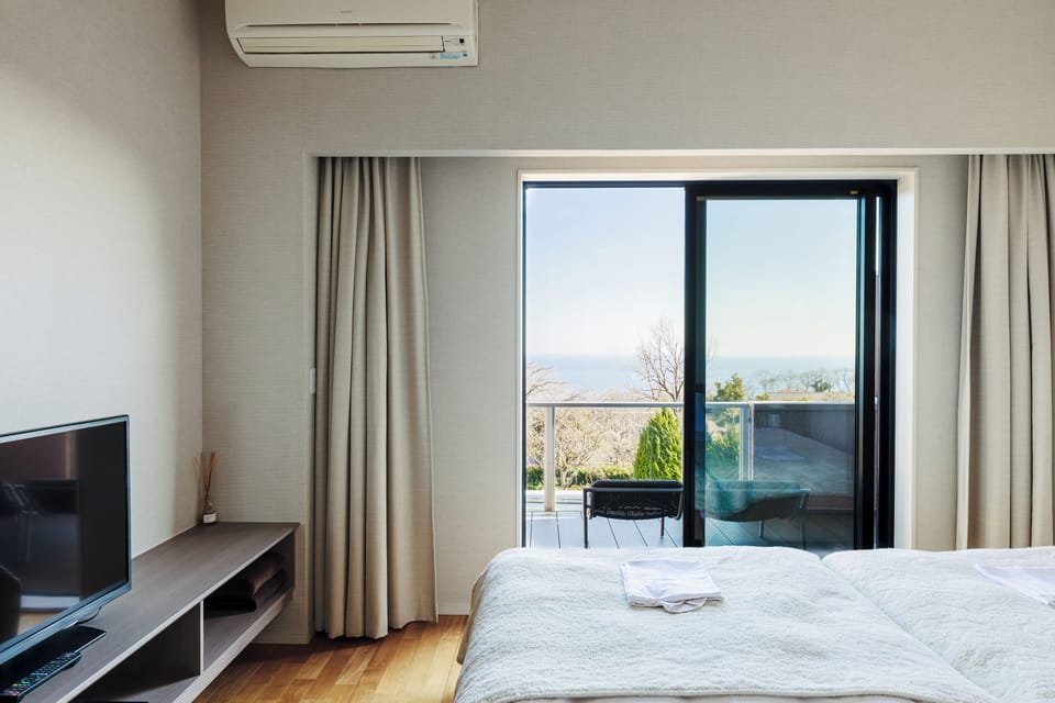 Deluxe Room with Ocean View Bathroom | 2 bedrooms, minibar, desk, free WiFi