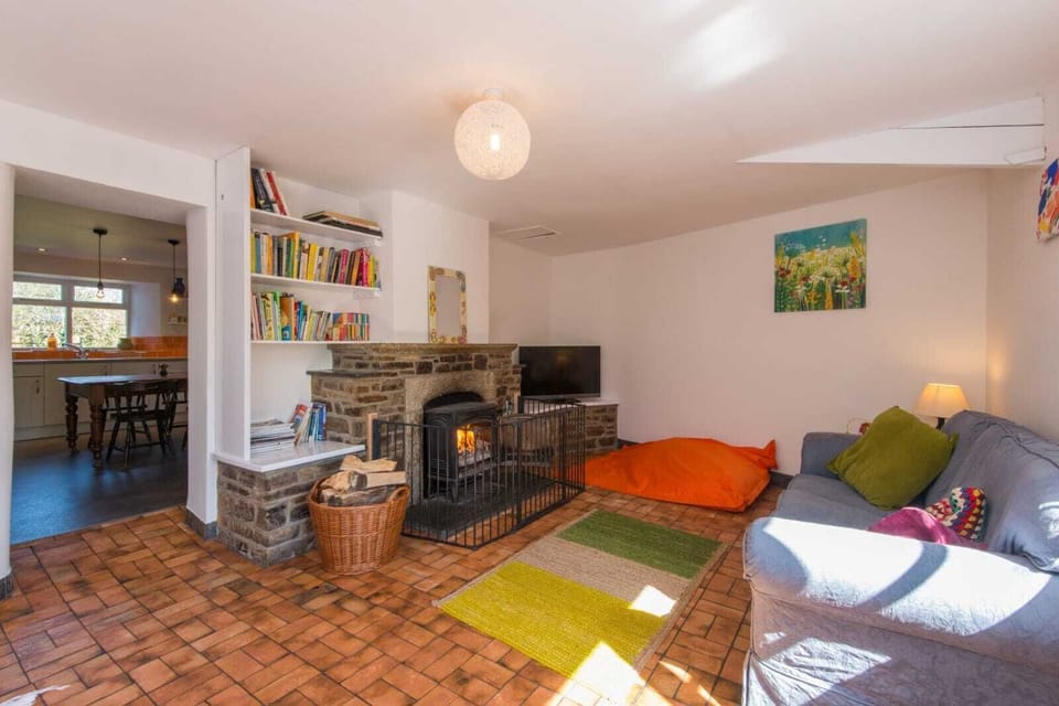 One of the living rooms situated of the kitchen 