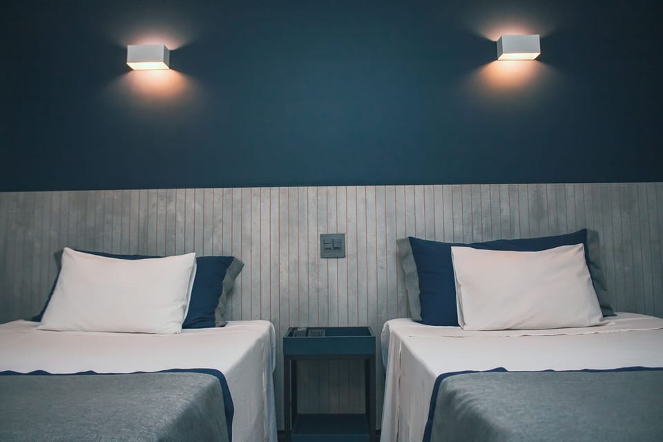Junior Room, 2 Twin Beds | Minibar, in-room safe, blackout drapes, free WiFi
