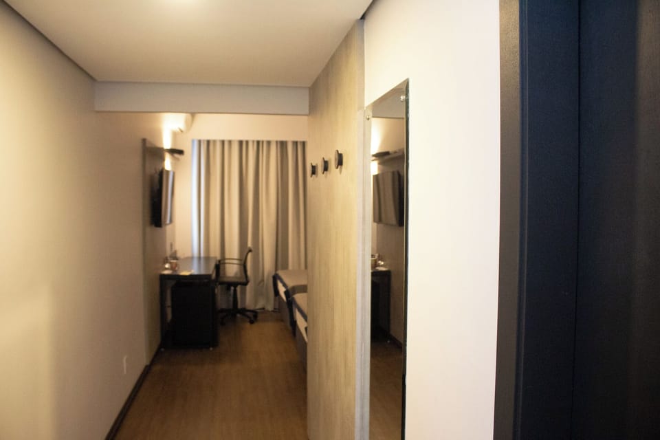 Junior Room, 2 Twin Beds | Minibar, in-room safe, blackout drapes, free WiFi