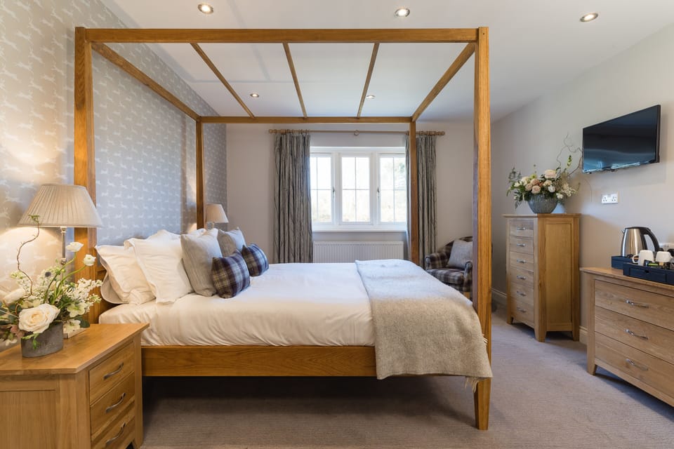 Desk, iron/ironing board, bed sheets