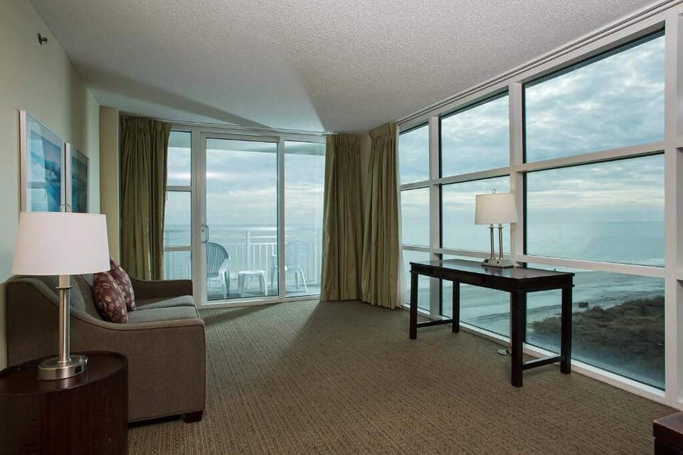 Premium Suite, 3 Bedrooms, Ocean View | Living room | 40-inch flat-screen TV with cable channels, TV