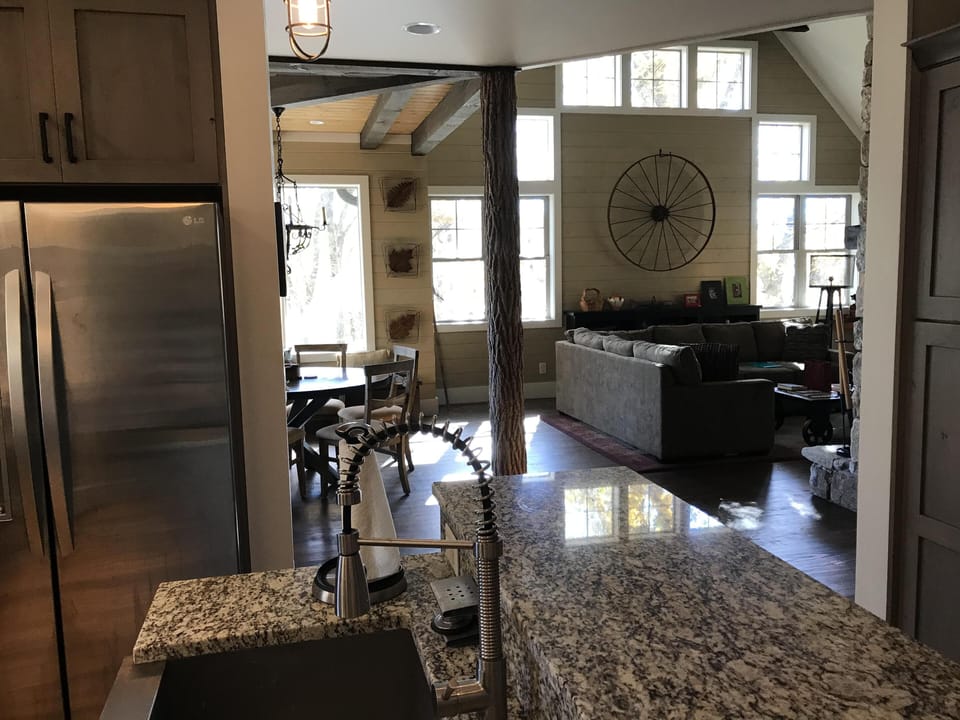 View from kitchen into living room and dining room