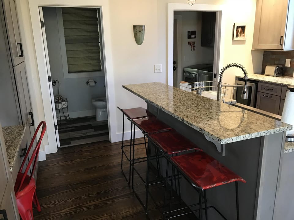 Half bath and laundry room off the kitchen