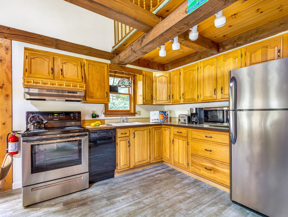Fully stocked & appointed kitchen with SS appliances. 