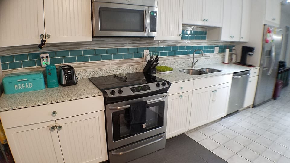 Microwave/range/cabinets. Newly remodeled.