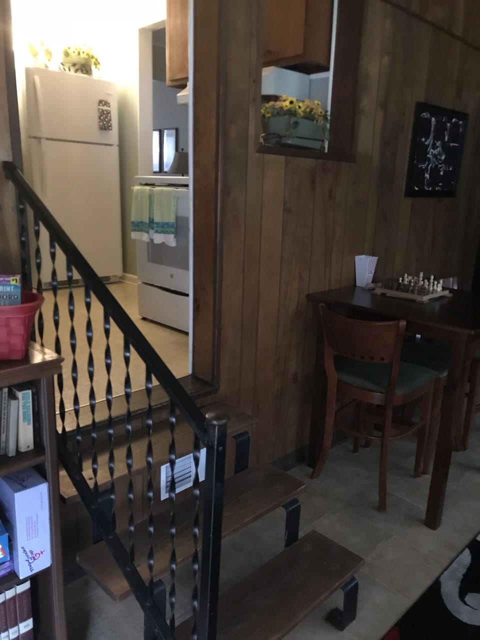 Stairs from game room into the kitchen 
