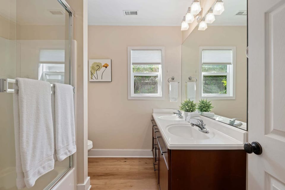 The Hall bathroom offers a shower and bathtub combination, great for kid's tub time after a day at the beach.