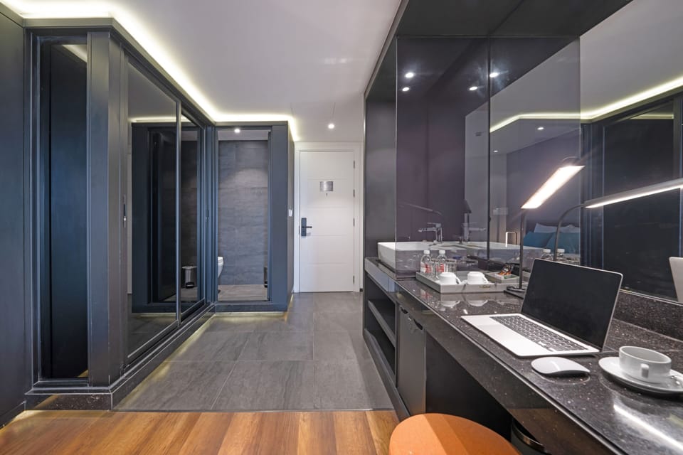 Superior Double Room with Balcony | Bathroom | Designer toiletries, hair dryer, bathrobes, slippers