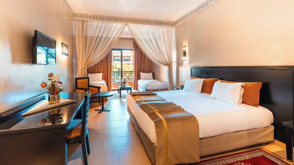 Family Room, Balcony | Premium bedding, pillowtop beds, minibar, in-room safe
