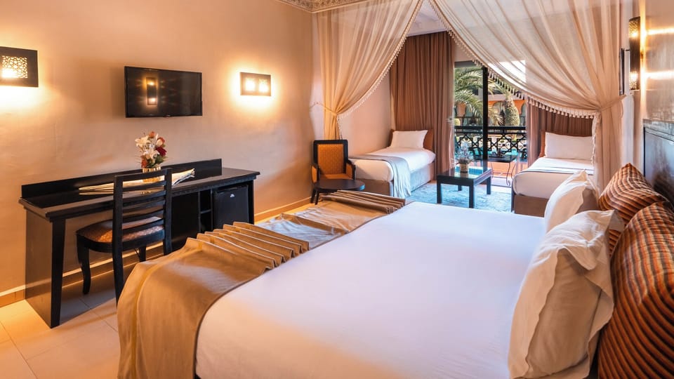 Family Room, Balcony | Premium bedding, pillowtop beds, minibar, in-room safe