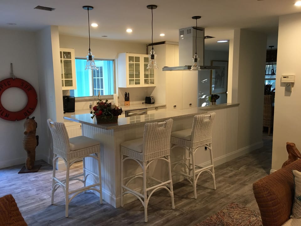 Kitchen area highlighting breakfast bar