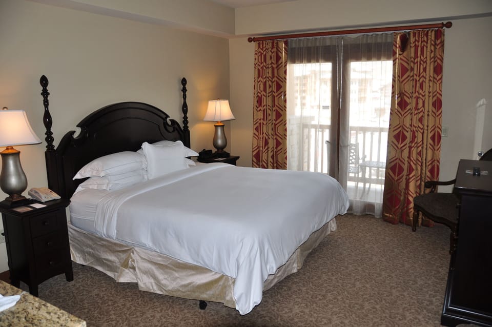 Master bedroom with king size bed and on-suite bathroom