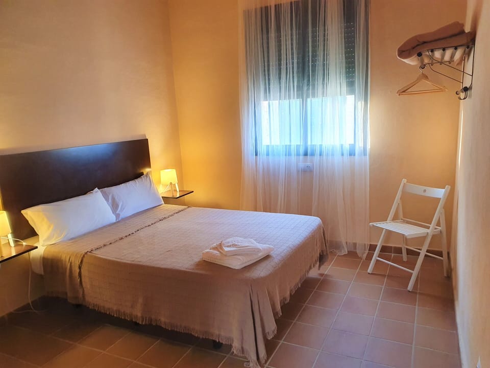 Double Room | Memory foam beds, individually decorated, desk, blackout drapes