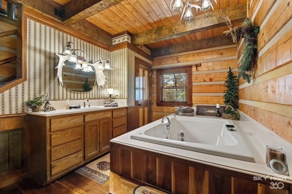 Large jacuzzi and vanity area.