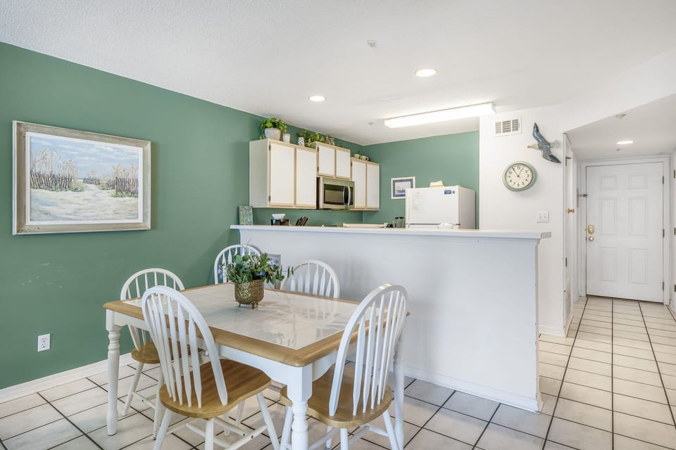 Gather at the table just steps from the kitchen.