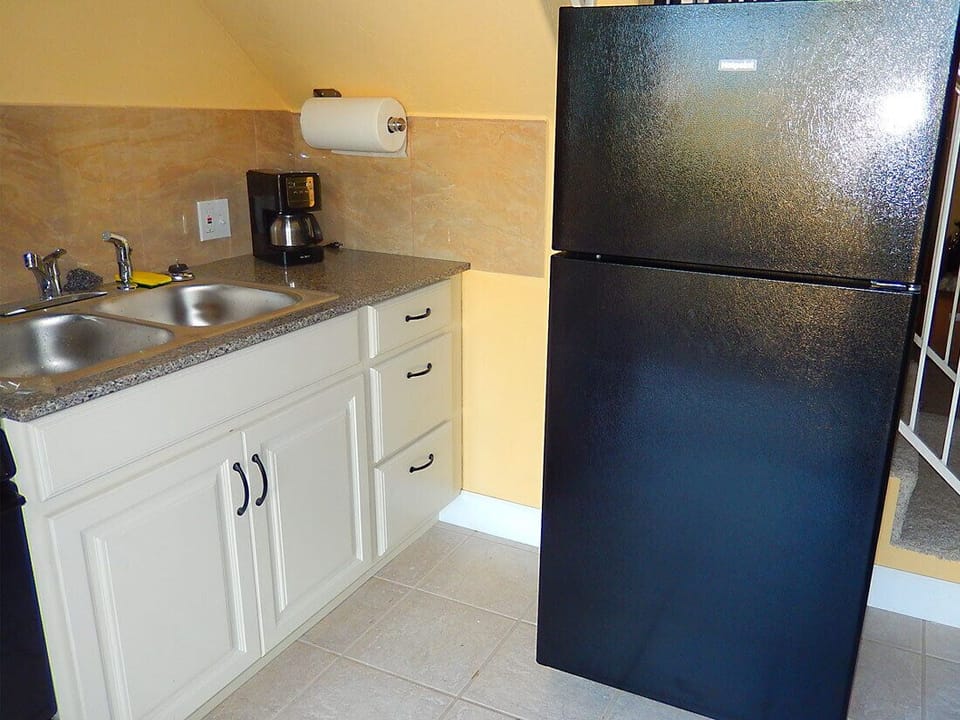 Kitchen with a fridge