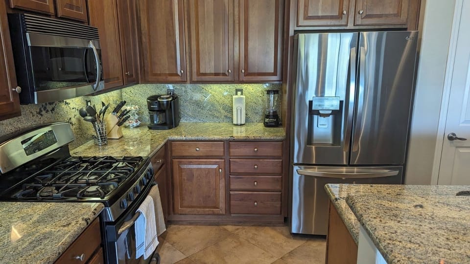 Kitchen with gas range.