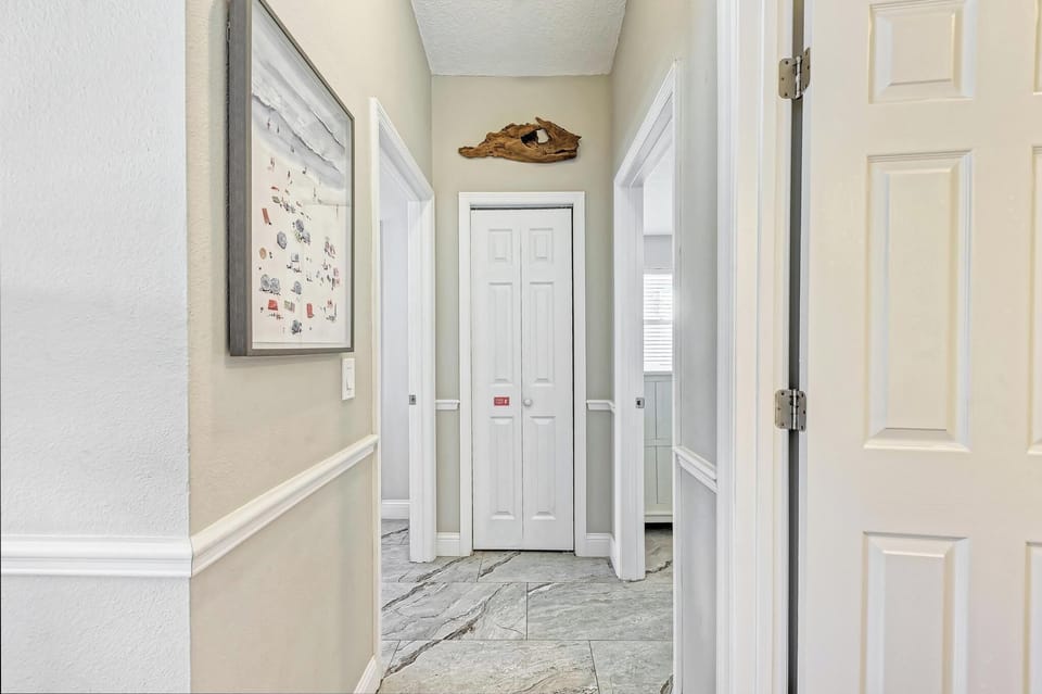 Hallway to Primary and Guest bedrooms